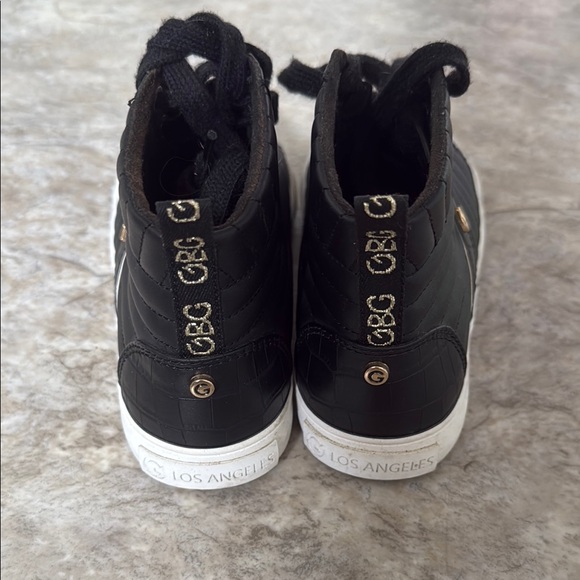 Black High-Top Sneakers with Gold Accents - Picture 3 of 4